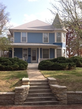 Front view with beautiful wrap around porch