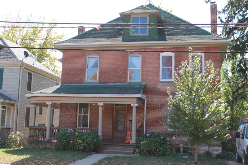 2 story Brick home with wraparound porch