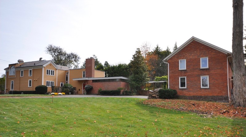 Farm House to left, Carriage House to right