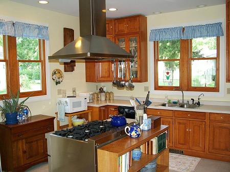 Kitchen has maple cabinets, a 6-burner Thermadore stove and a seperate eating area