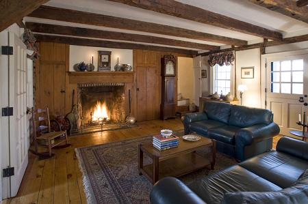 Family room with original fireplace and woodwork
