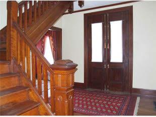Foyer with cherry staircase
