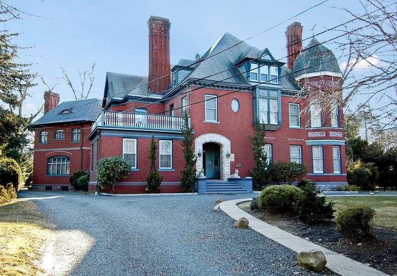 UP THE CIRCULAR DRIVEWAY AWAITS THIS FINE VICTORIAN MANSION