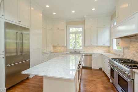 White marble gourmet kitchen