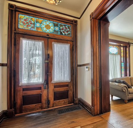 Interior view of the front door and hallway