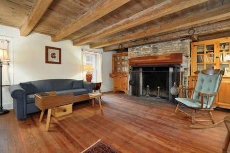 Living Room with Fireplace and Beamed Ceilings