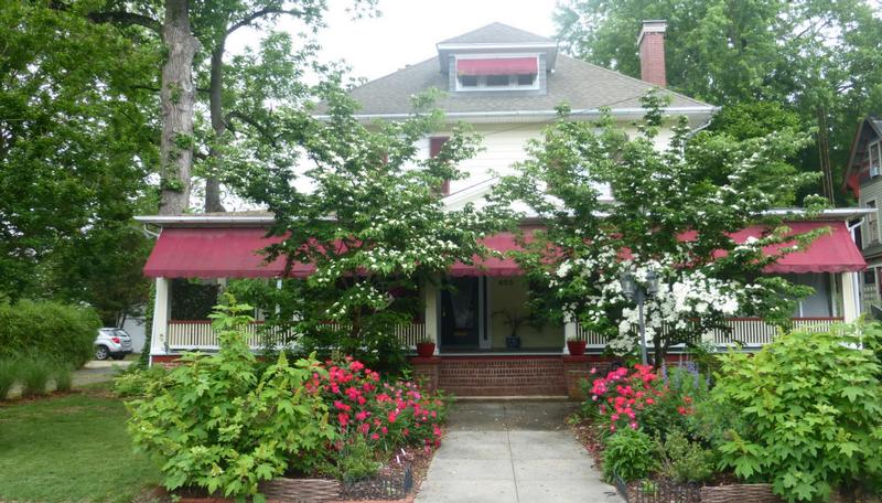The House with the Red Awnings