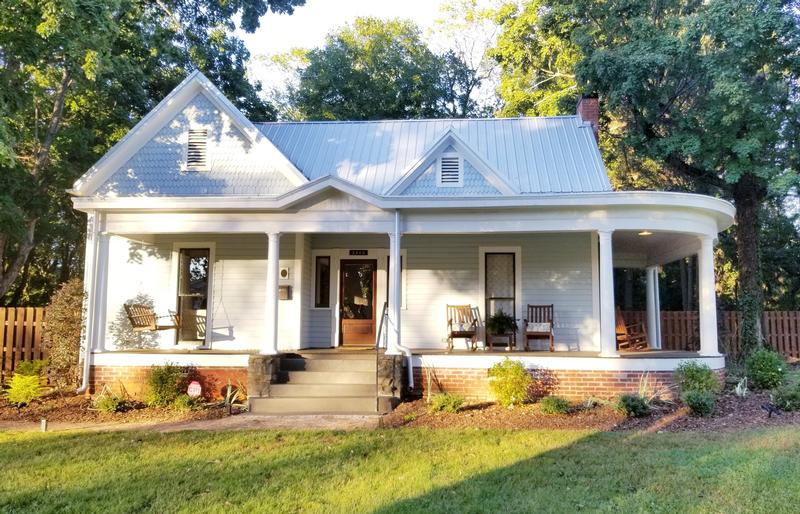 Exterior front featuring wraparound porch