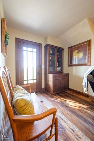 Front hall with built in bookcase